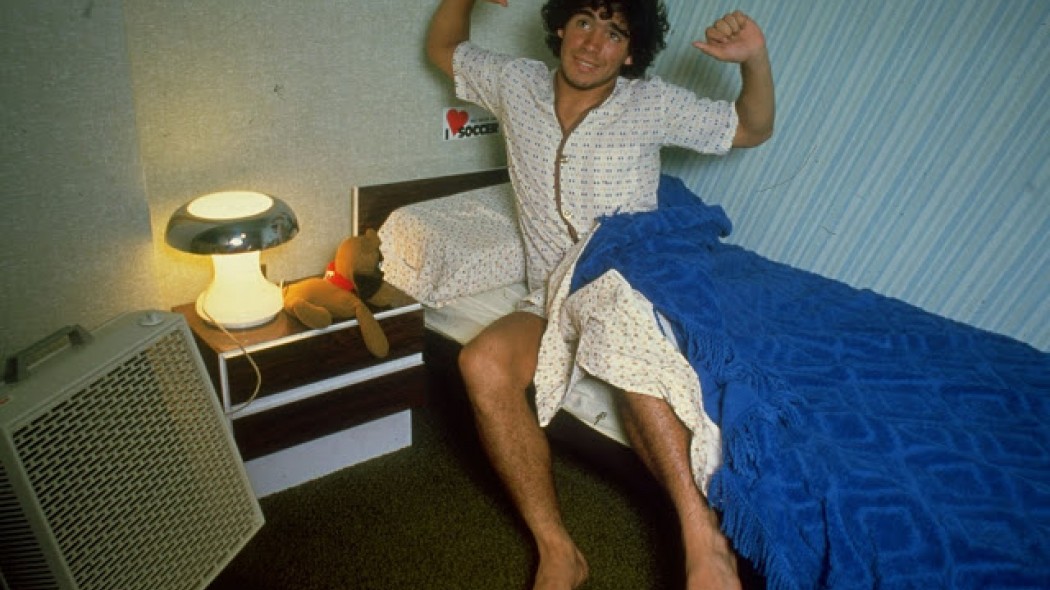 diego_maradona_stretches_as_he_prepares_to_get_out_of_bed_at_home_in_argentina_1980_0